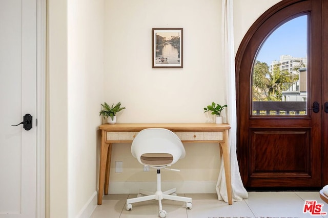 office space featuring light tile patterned flooring