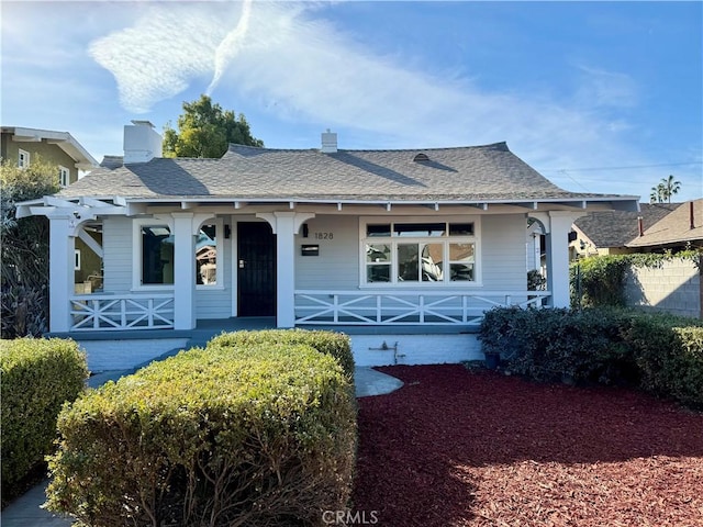 view of front of property featuring covered porch