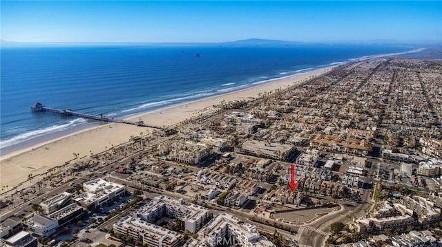 aerial view with a view of the beach and a water view