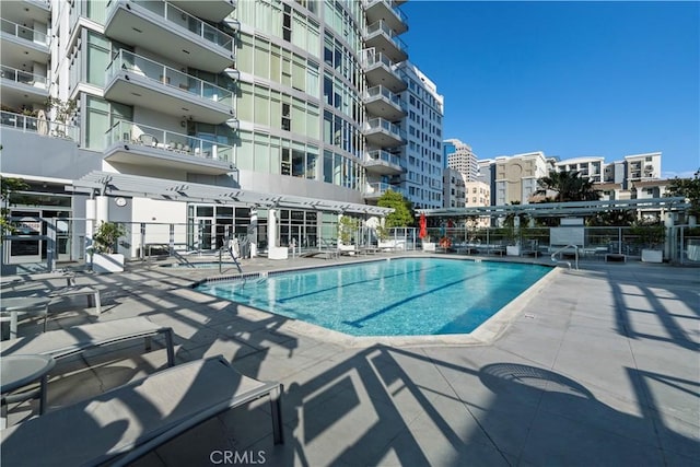 view of pool featuring a patio