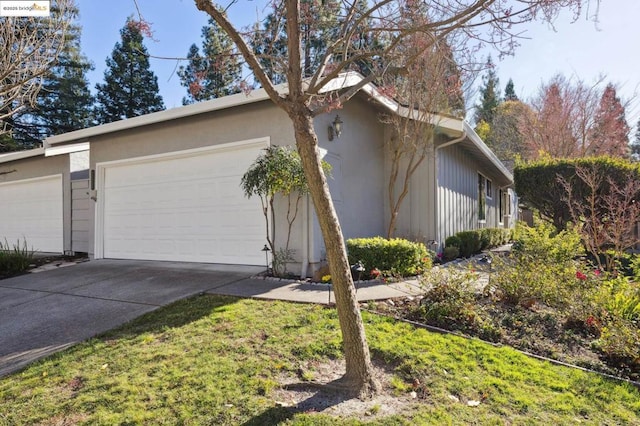 view of side of home featuring a yard