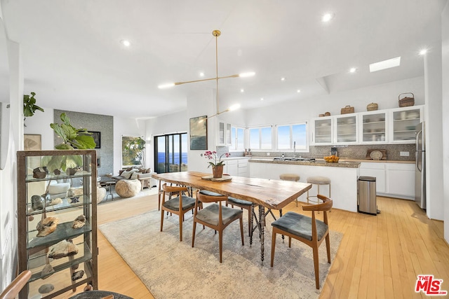 dining area featuring light wood-type flooring