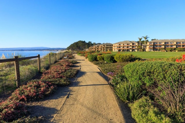 exterior space with a water view