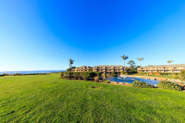 view of yard featuring a water view