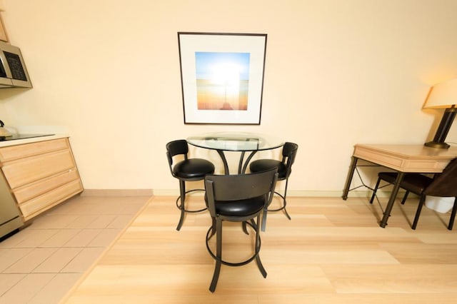 dining room featuring light hardwood / wood-style floors