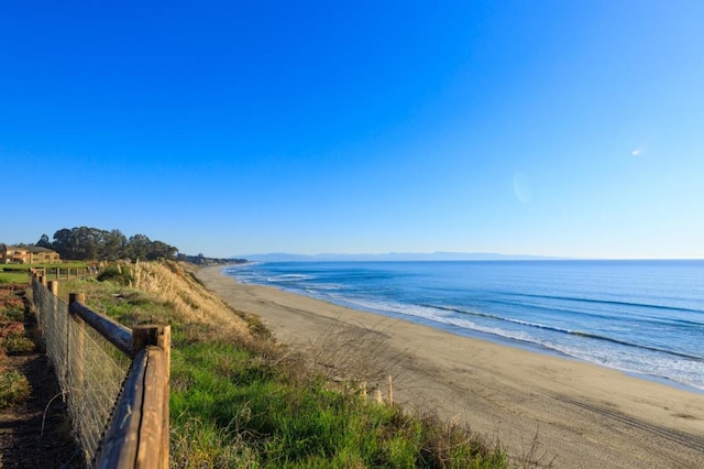 view of water feature with a beach view