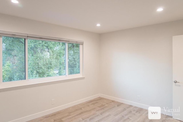 empty room with light wood-type flooring