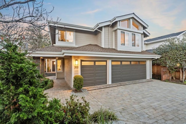 view of front of property featuring a garage