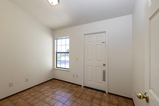 view of tiled spare room