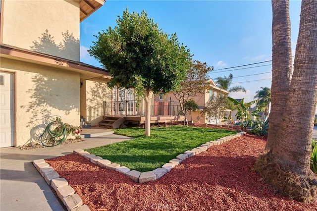 view of yard featuring a deck