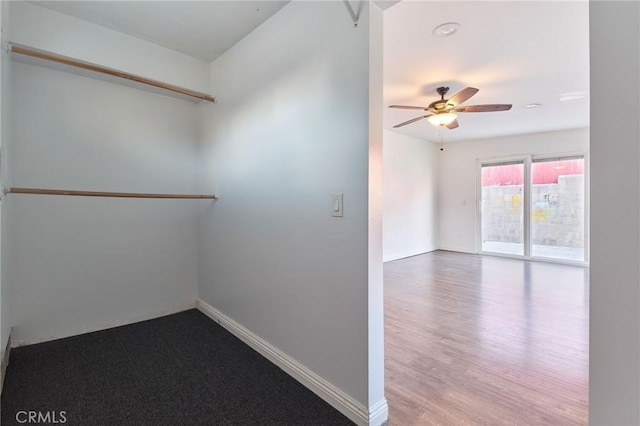 unfurnished room featuring ceiling fan and light hardwood / wood-style flooring