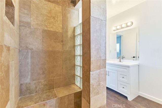 bathroom with vanity and walk in shower