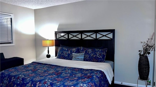 bedroom with a textured ceiling