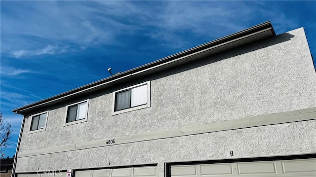 view of home's exterior with a garage