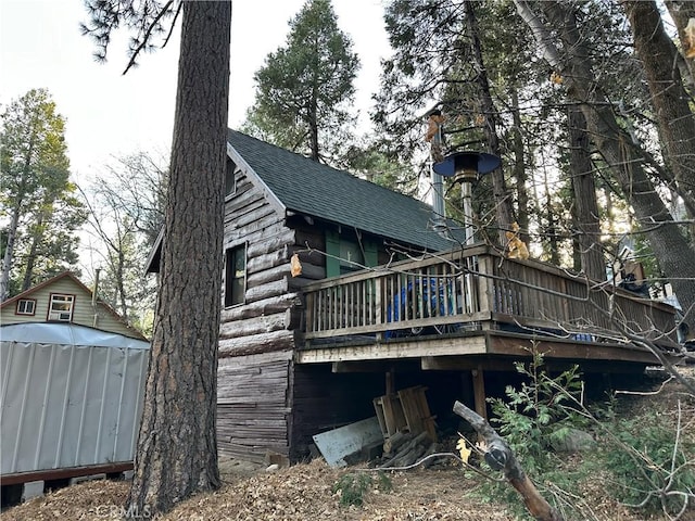 rear view of property with a deck