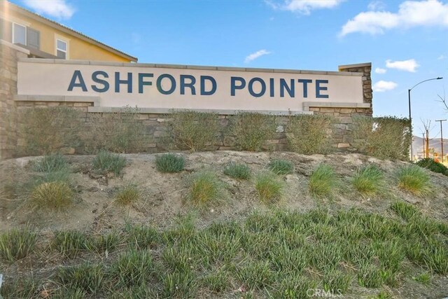 view of community sign