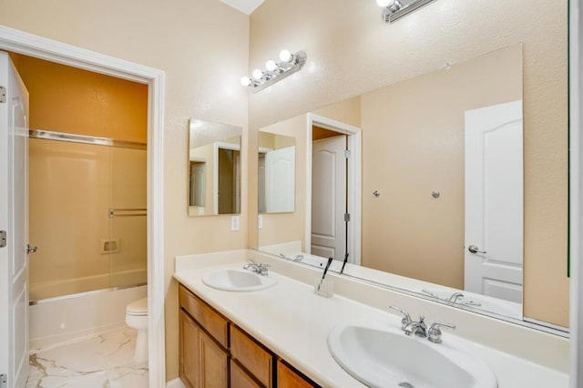 full bathroom with vanity, shower / washtub combination, and toilet