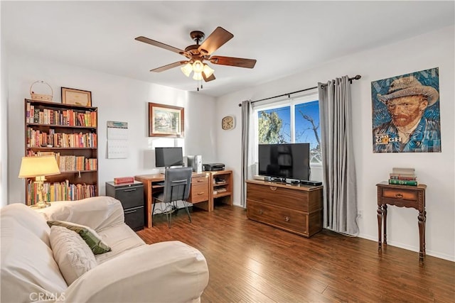 office space with dark hardwood / wood-style flooring and ceiling fan