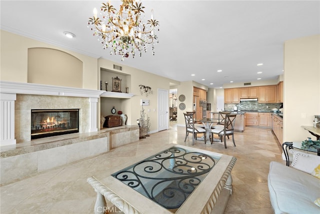 living room featuring a high end fireplace