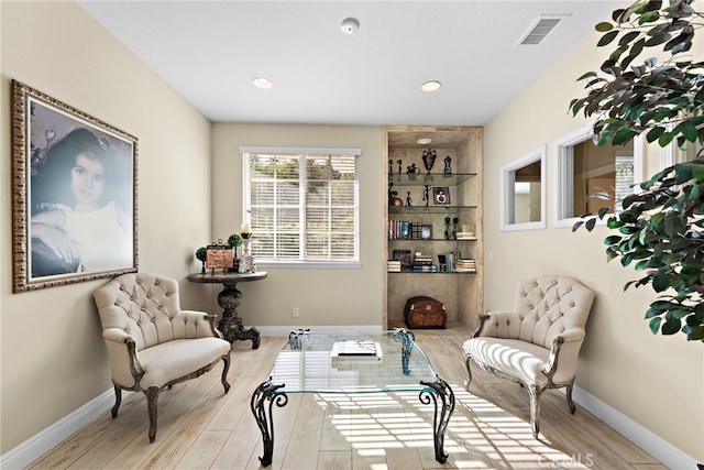 sitting room featuring light wood-type flooring