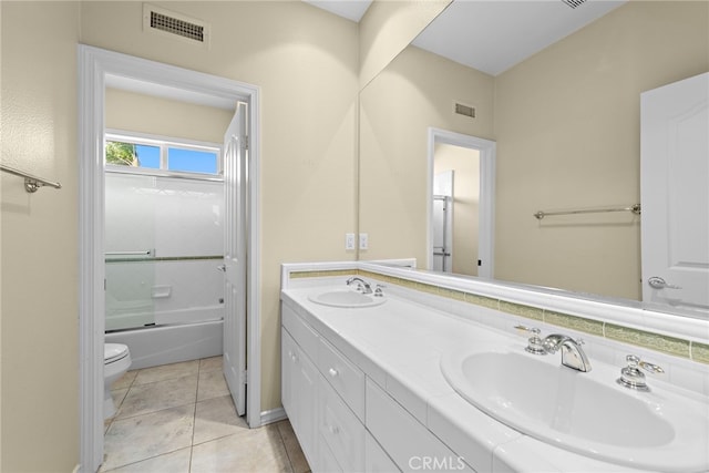 full bathroom with tile patterned flooring, vanity, bathtub / shower combination, and toilet