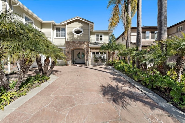 view of front of property with a garage