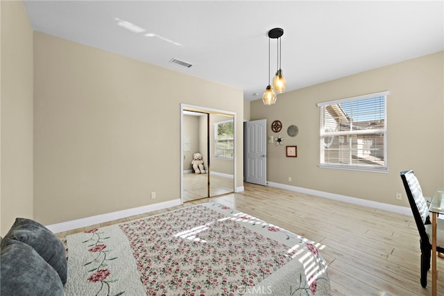 sitting room featuring light hardwood / wood-style floors