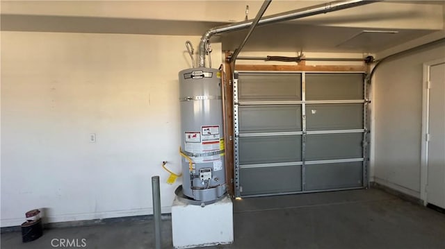 garage featuring strapped water heater