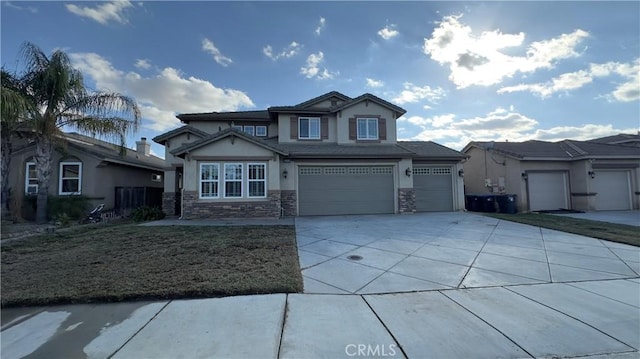 view of front of property with a garage