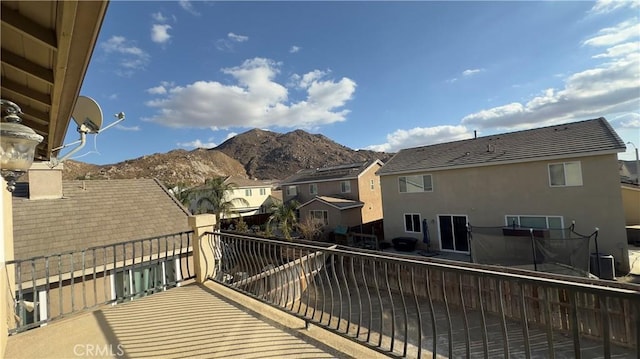 balcony featuring a mountain view