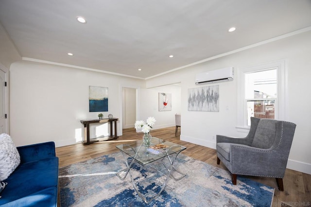 living room with hardwood / wood-style flooring, ornamental molding, and an AC wall unit