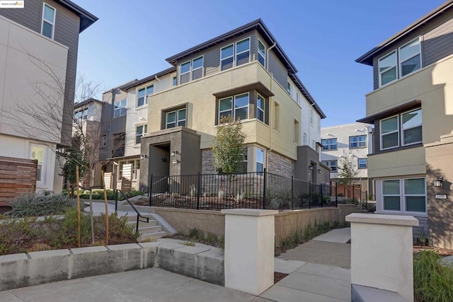 view of front of property featuring a patio