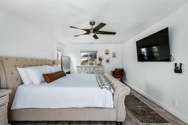 bedroom featuring hardwood / wood-style flooring and ceiling fan