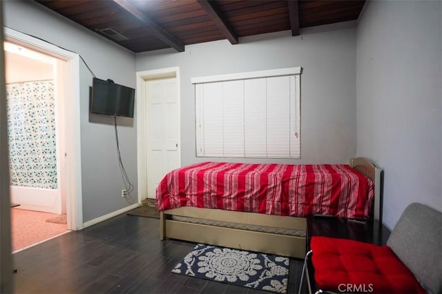 bedroom featuring wooden ceiling, dark hardwood / wood-style flooring, and beam ceiling