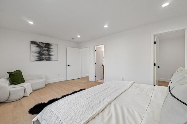 bedroom featuring light hardwood / wood-style flooring