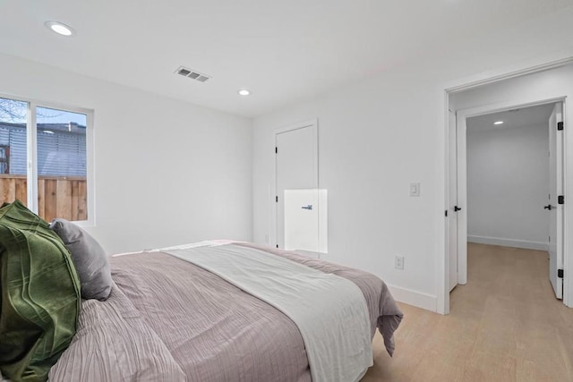 bedroom featuring light wood-type flooring