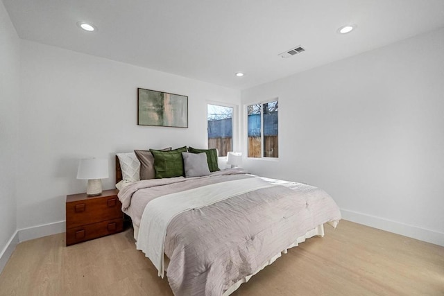 bedroom with light wood-type flooring