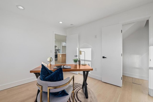 home office featuring light hardwood / wood-style floors