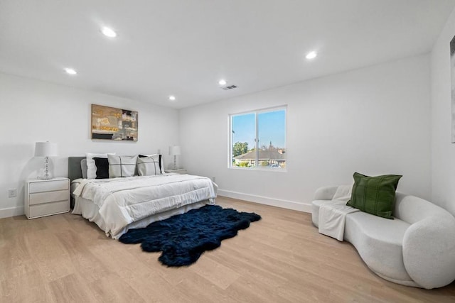 bedroom featuring light hardwood / wood-style flooring