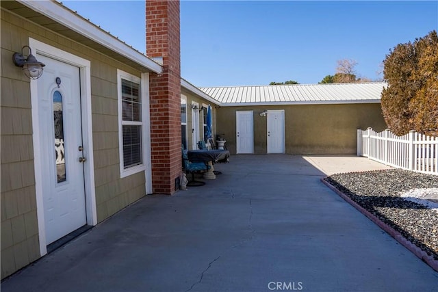 view of patio with fence