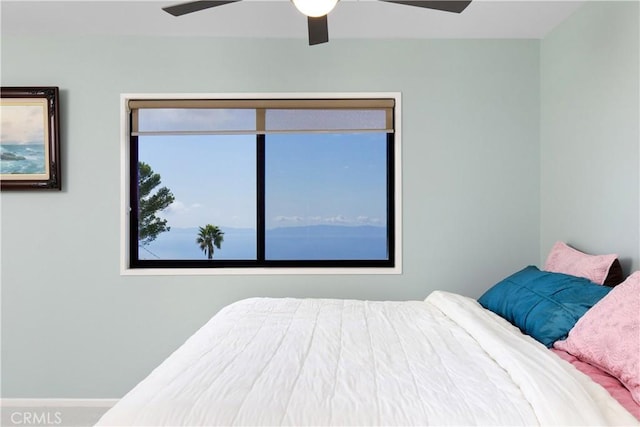 bedroom featuring ceiling fan