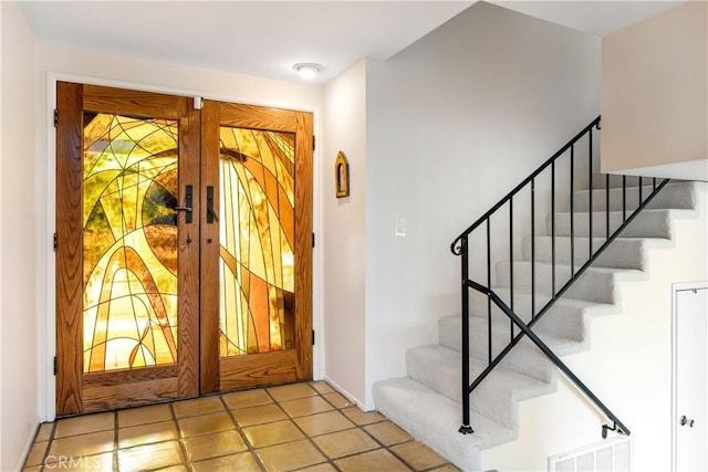 foyer featuring french doors