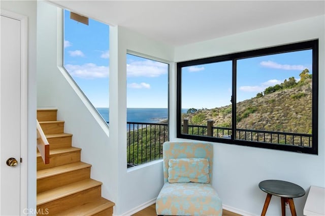 living area with a water view