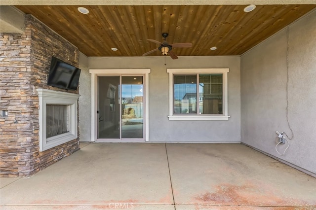 view of patio / terrace featuring ceiling fan