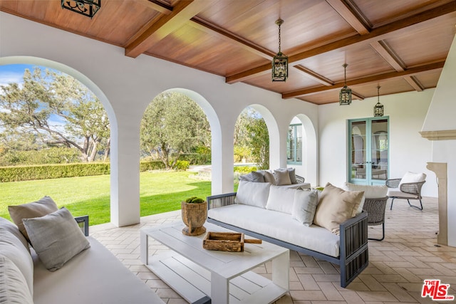 view of patio featuring an outdoor living space and french doors