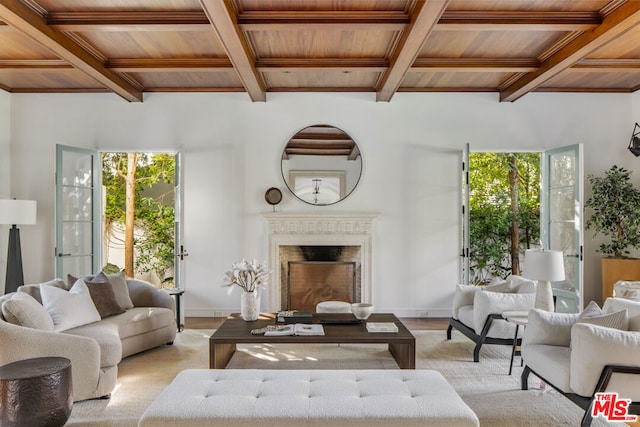 living room featuring beam ceiling, coffered ceiling, and wood ceiling