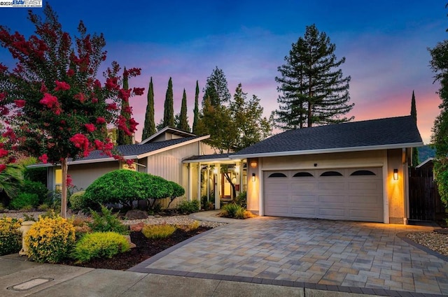 view of front of property featuring a garage