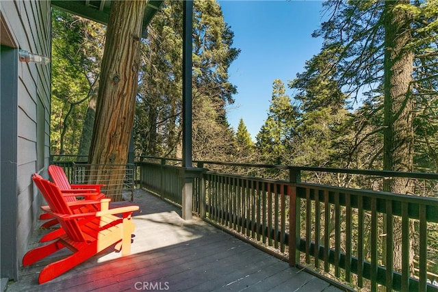 wooden balcony featuring a wooden deck