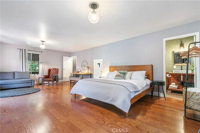 bedroom with wood-type flooring