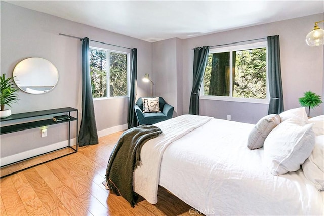 bedroom with light hardwood / wood-style flooring